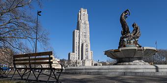 Cathedral of Learning in background of Frick fountain.