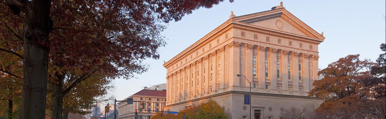 Alumni Hall with morning sunlight on exterior