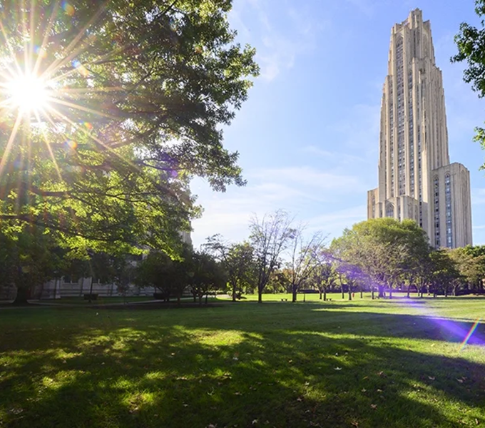 View of Cathedral of Learning and its lawn on a sunny day